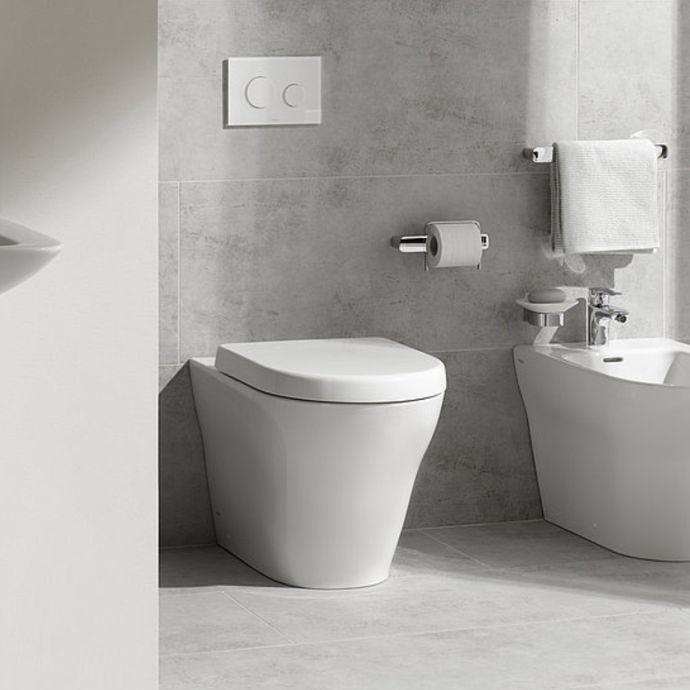 Lifestyle image of the TOTO MH Back to Wall Rimless Toilet